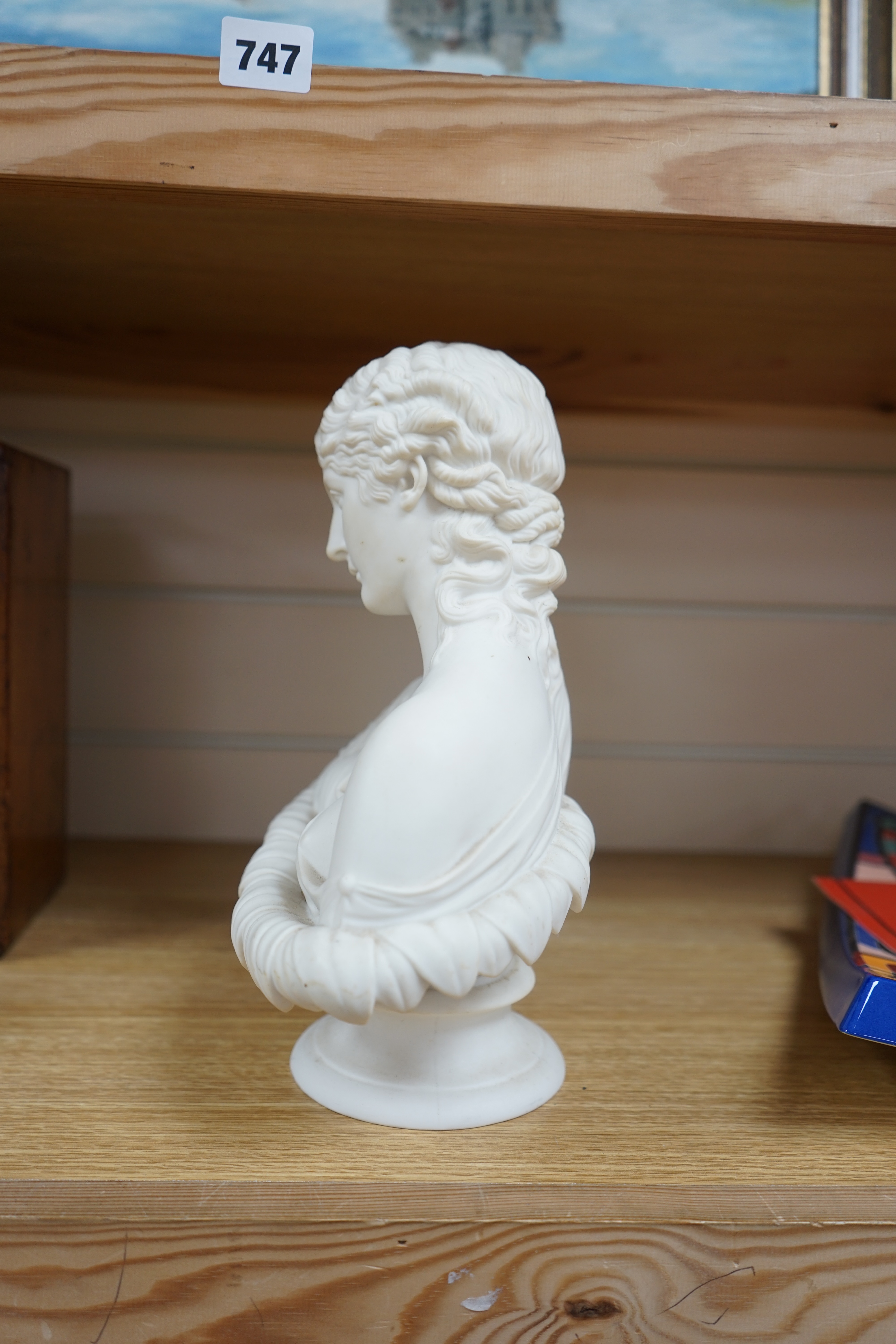 A Parianware bust of Clytie, 28cm high. Condition - good